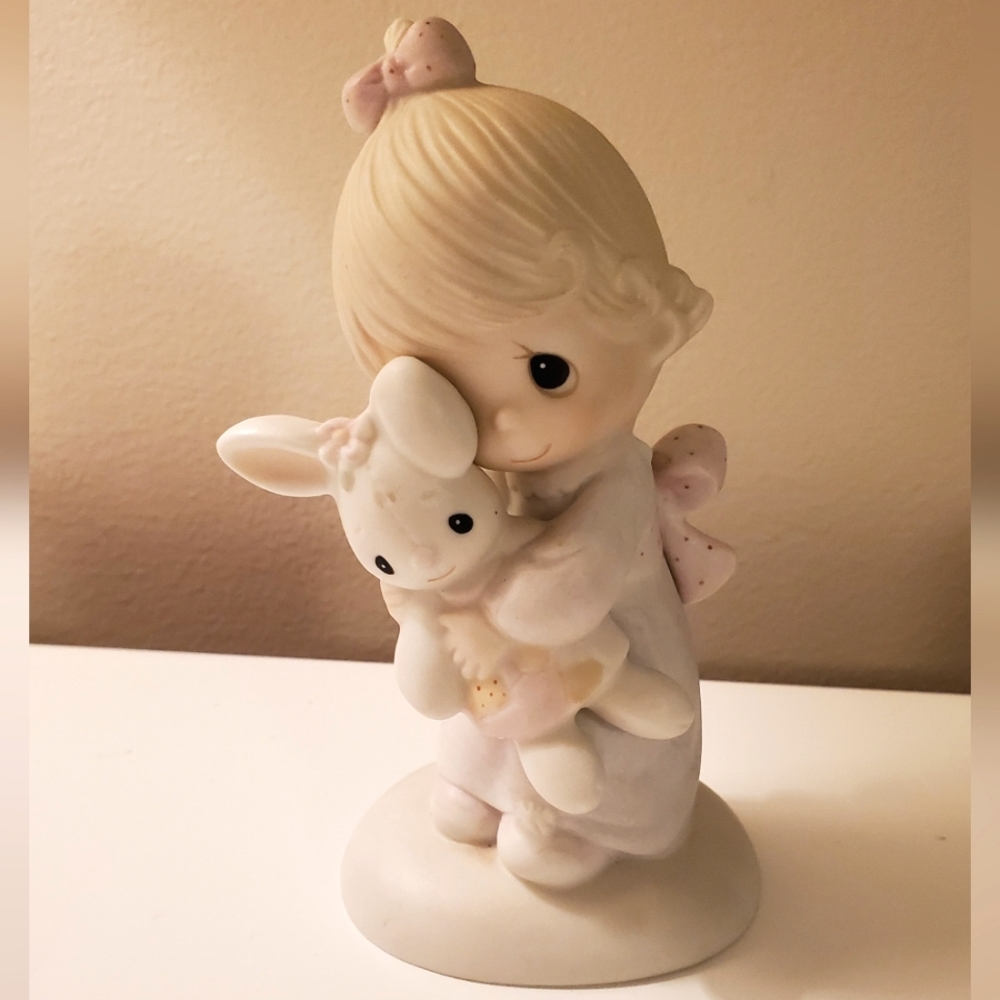 Precious Moments Jesus loves me figurine.